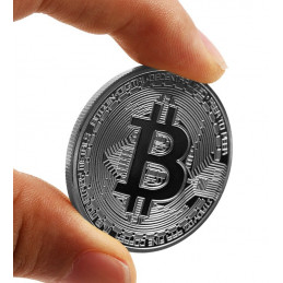 Bitcoin munt, zilverkleur, in opbergdoosje